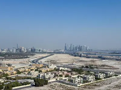 an aerial view of the city of dubai from the beach at 21 Vida Dubai Mall 1 bedroom in Dubai