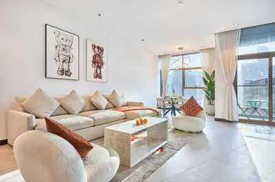 a living room with a couch and a table at Premium 15 Northside Residences in Business Bay, Close to Downtown Dubai & Burj Khalifa by Stayfinity in Dubai