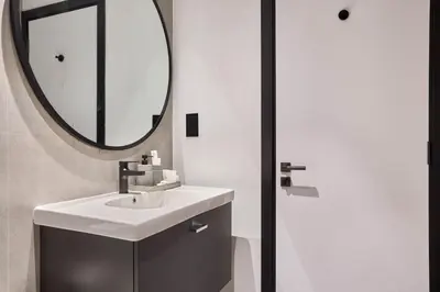 a bathroom with a sink and a mirror at Premium 15 Northside Residences in Business Bay, Close to Downtown Dubai & Burj Khalifa by Stayfinity in Dubai