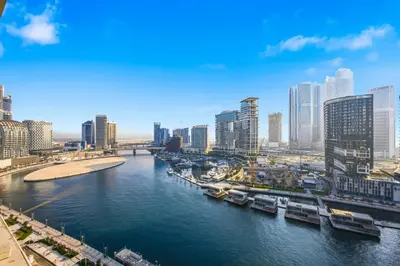 a view of a city with a river and buildings at 3 Bedroom unit at DAMAC maison Canal Views in Dubai