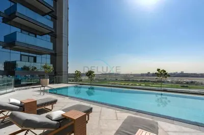 a swimming pool on top of a building at City Living with Street Views, Just a Walk to Bus Stop, Easy Transport to Burj Khalifa and Dubai Mall, Nobles Tower, Business Bay by Deluxe Holiday Homes in Dubai
