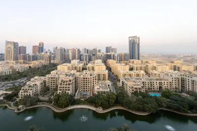 an aerial view of a city with tall buildings at Modern Retreat in The Views with Balcony & Pool in Dubai