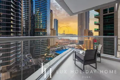a balcony with a view of a city at LUX The Sky Dubai Eye View Suite in Dubai
