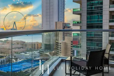 a balcony with a view of the city at LUX The Sky Dubai Eye View Suite in Dubai
