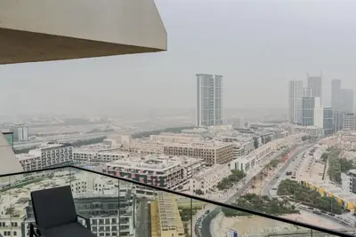 a view of a city from the top of a building at TRPS - Binghatti Royale, JVC - Private Pool, Luxury Furnished, Brand New in Dubai