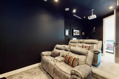 a living room with a couch in a room at Vacationer l Magnificent 4 Bedroom l Penthouse l Marina Views in Dubai