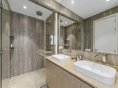a bathroom with a large sink and a mirror at Redwood Townhouse Jumeirah Golf Estates in Dubai