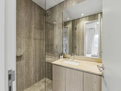 a bathroom with a sink and a shower at Redwood Townhouse Jumeirah Golf Estates in Dubai