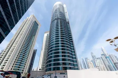 a tall building in a city with tall buildings at GuestReady - 1BR | Elegant Duplex | JLT in Dubai
