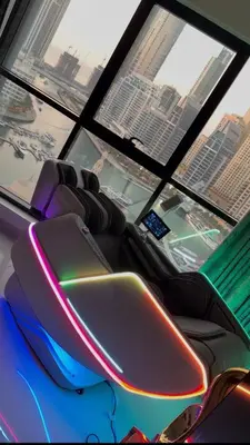 a group of seats in a bus with windows at Futuristic luxury apartment, 360 lake view balcony in Dubai