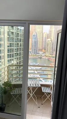 a balcony with a view of a city skyline at Luxury 1BR Apt with water canal & Marina View in Dubai