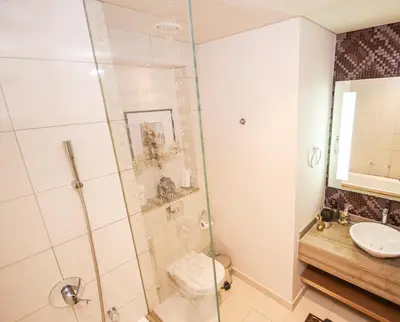 a bathroom with a shower and a sink at Newly Furnished Luxury 1BHK at Paramount Tower D in Dubai