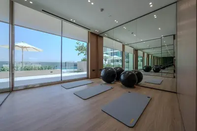 a room with yoga mats on the floor at Luxe Studio Perch in Binghatti Azure with Pool & Gym in Dubai