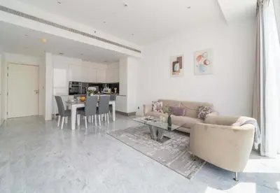a living room with a couch and a table at Test Property - NoBookings in Dubai