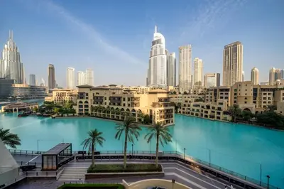 a view of a city with a large body of water at Stunning 2BR with Burj Lake View at The Residences in Dubai