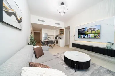 a living room with a couch and a table at Stylish 1 Bed in Downtown with Dubai Mall Access in Dubai
