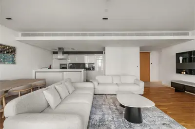 a living room with a couch and a table at Modern 2BDR in Bluewaters Beach&Pool in Dubai