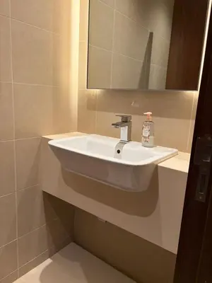 a white sink in a bathroom with a mirror at Marina Gate, Full Marina View, Excellent Location, Dubai Marina in Dubai Marina
