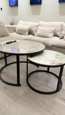 two coffee tables in front of a couch at Burj, Canal & Dubai Mall Luxe Stay for 6 in Dubai