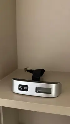 a remote control sitting on top of a table at Burj, Canal & Dubai Mall Luxe Stay for 6 in Dubai