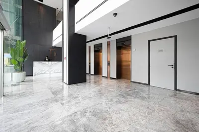 an empty hallway with a door in a building at Waves - Chic Business Bay 1BR - Bright and Modern in Dubai