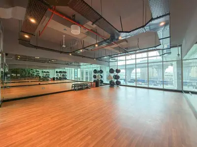 a bowling alley with a wooden floor in a gym at Chic 2BHK Retreat with Marina Views by Czechin in Dubai