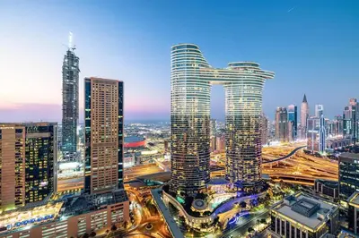 a view of a city with many tall buildings at Modern 4BR Suite Overlooking Downtown in Dubai