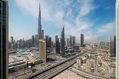 a view of a city with many tall buildings at 4Bedroom Luxury Stay in Downtown Views Dubai Mall in Dubai