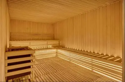a empty wooden sauna with empty shelves in it at Burj Khalifa View High Floor and Brand New in Dubai