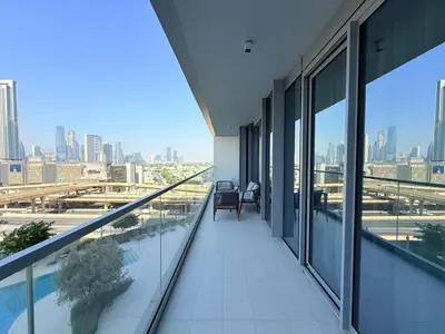 a balcony of a building with a view of the city at Center to Burj Khalifa I Brand New I High End in Dubai