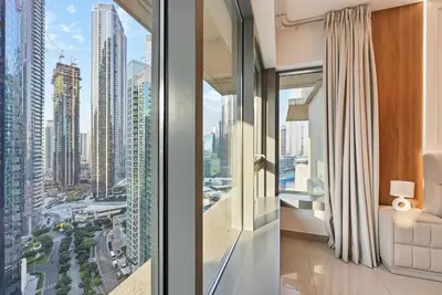 a hotel room with a view of a city at 22nd Floor Burj Khalifa View 5 Min Walk Dubai Mall in Dubai