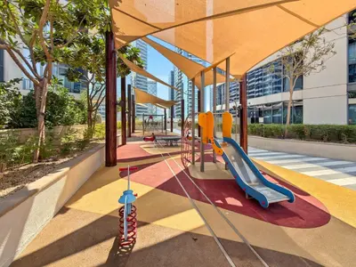 a playground with a slide in a building at Luxury 1BHK Burj Khalifa View Short Walk Dubai Mall in Dubai