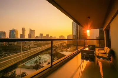 a balcony with a view of a city skyline at Designer 2BR with Jacuzzi near Burj Khalifa in Dubai