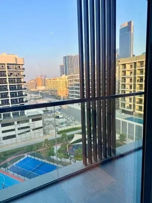 a balcony with a view of a city with buildings at Luxury Brand new 2BR nearby DIFC in Dubai
