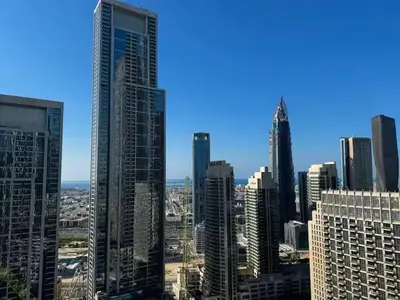 a view of a city with tall buildings at Luxury 1Bedroom Burj Khalifa View from Infinity Pool Grande Signature Residences in Dubai