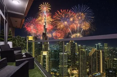 a view of fireworks from the rooftop of a building at Burj Khalifa View II Luxury HIGH Floor whith Pool&Spa in Dubai