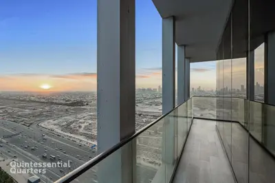 a view from the glass floor of a building with a city at Stylish & Peaceful 2BR Home in JVC District in Dubai