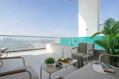 a living room with a view of a city at Frank Porter - Binghatti Onyx in Dubai