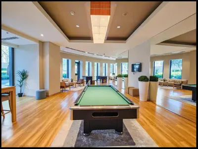a large room with a pool table in it at Downtown Luxury Two Bedroom Apartment I Conntected To Dubai Mall And Metro I Steps Away From Burj Khalifa I by Luxury Space in Dubai