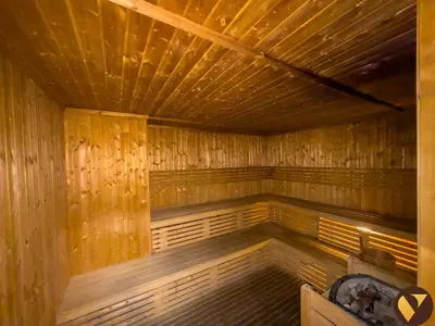a large wooden sauna with a wooden ceiling at Vogue Arjan Siraj Tower near Miracle Garden and Dubai Hills Mall, One Bedroom Apartment with Large Balcony and City View, Access to all Amenities in Dubai