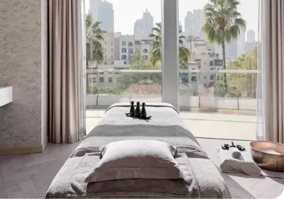 a bedroom with a bed and a large window at Dubai Mall Luxury 1Bed The Address in Dubai