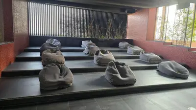 a group of bags sitting on steps in a room at Bayz by Danube by That Place Home Living in Dubai