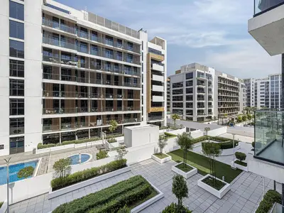 an aerial view of an apartment complex with buildings at Livin' Holidays - Studio - Azizi Lovely Studio in Dubai