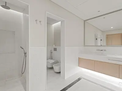 a white bathroom with a sink and a toilet at Luxe Island Retreat 1BR in Palm-14 in Dubai
