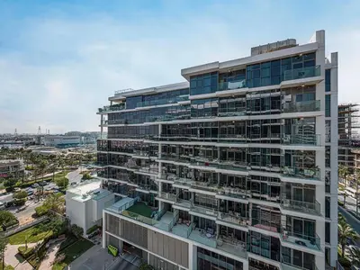 an aerial view of a tall building at Livin' Holidays - 1 BR - Elegant Apartment in Dubai