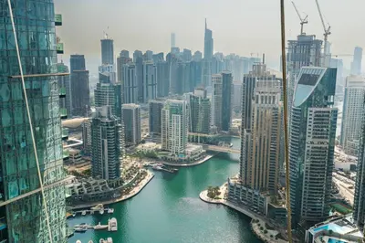 an aerial view of a city with a river at CitiHome - Luxurious Marina View - Jumeirah Living in Dubai
