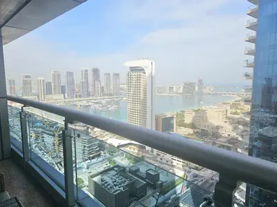 a view of a city from a balcony of a building at Newly Upgraded 3-BR close to Barasti Beach in Dubai