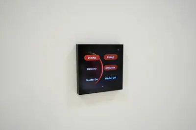 a digital clock on a white wall at 2BR Luxury, 2,5 bath, Baby bed, Gym & Pool in Dubai