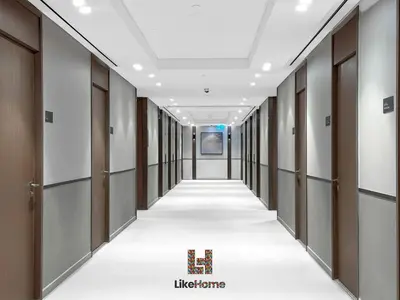 an empty corridor of a building with doors and a hallway at BEST BURJ VIEW IN DUBAI DOWNTOWN 2BR in Dubai