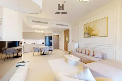 a living room with a couch and a table at NEXT TO BURJ AND DUBAI MALL 2 BR BEST LOCATION in Dubai